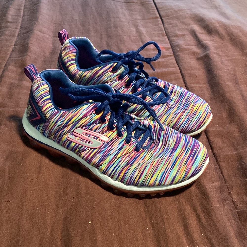 Sneakers by Sketchers Brand.   EUC!